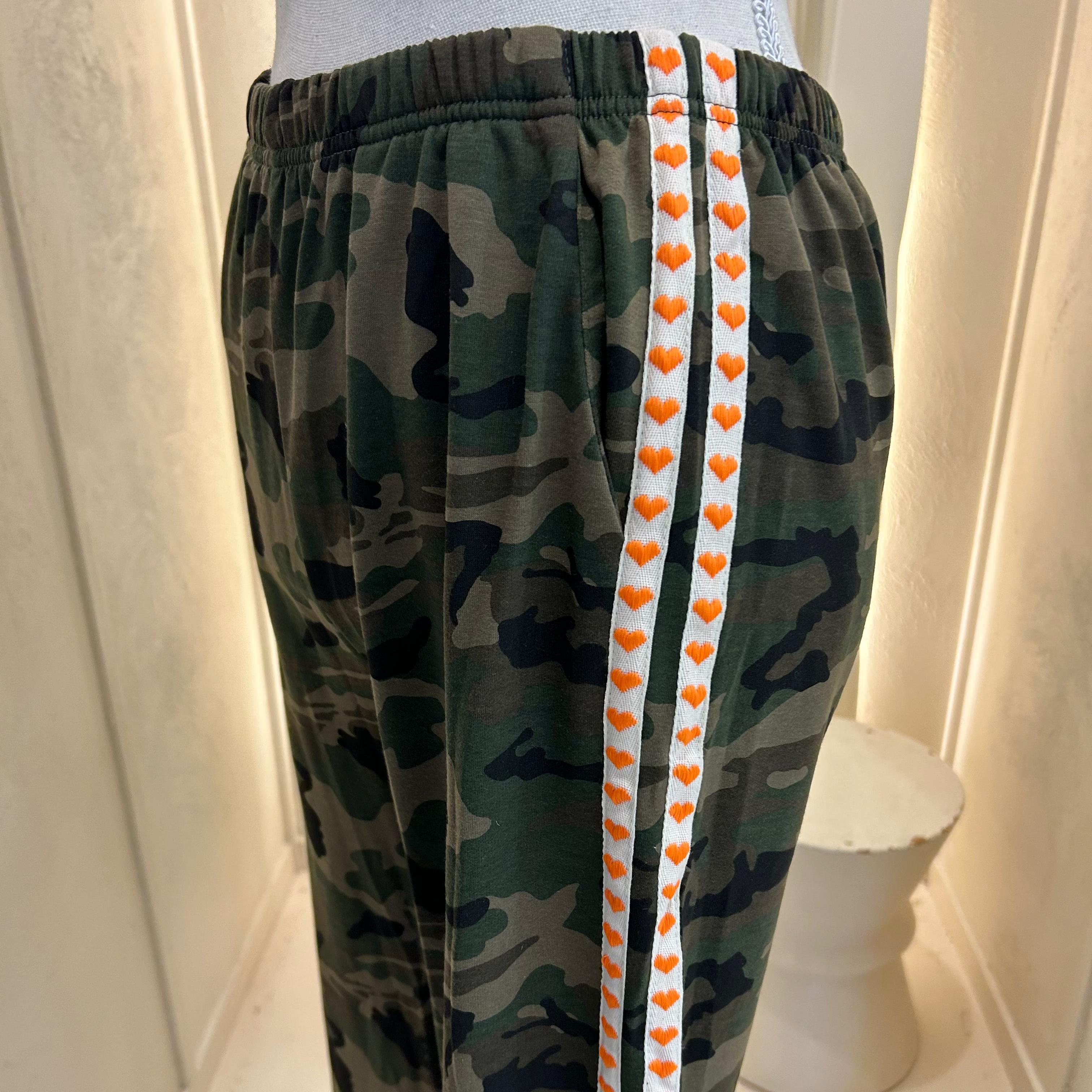 orange heart racer stripe camo pants - by Frankie
